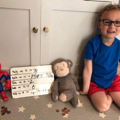 Henry Halving with his toys